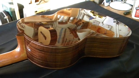 French polish finish work on a handcrafted classical guitar