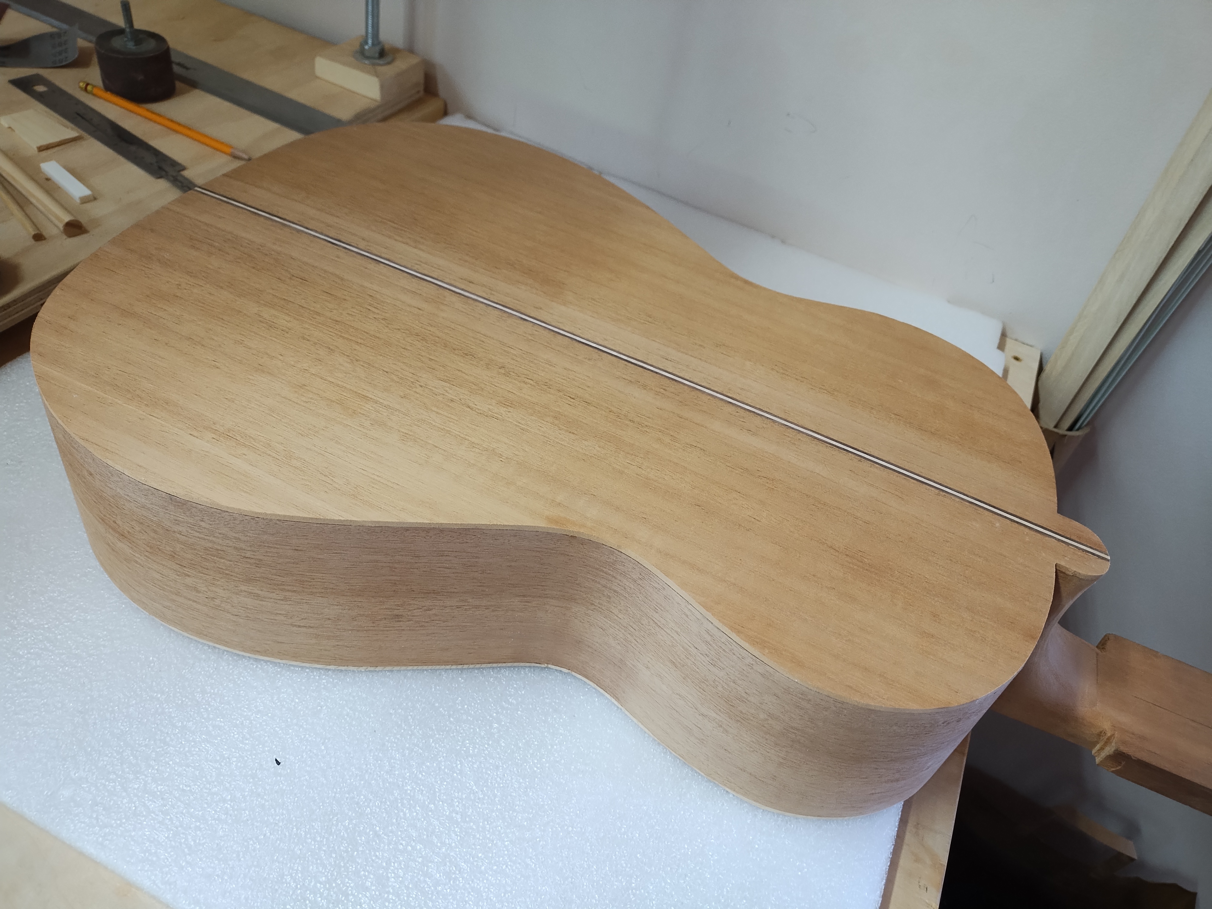 Assembled classical guitar body in the workshop