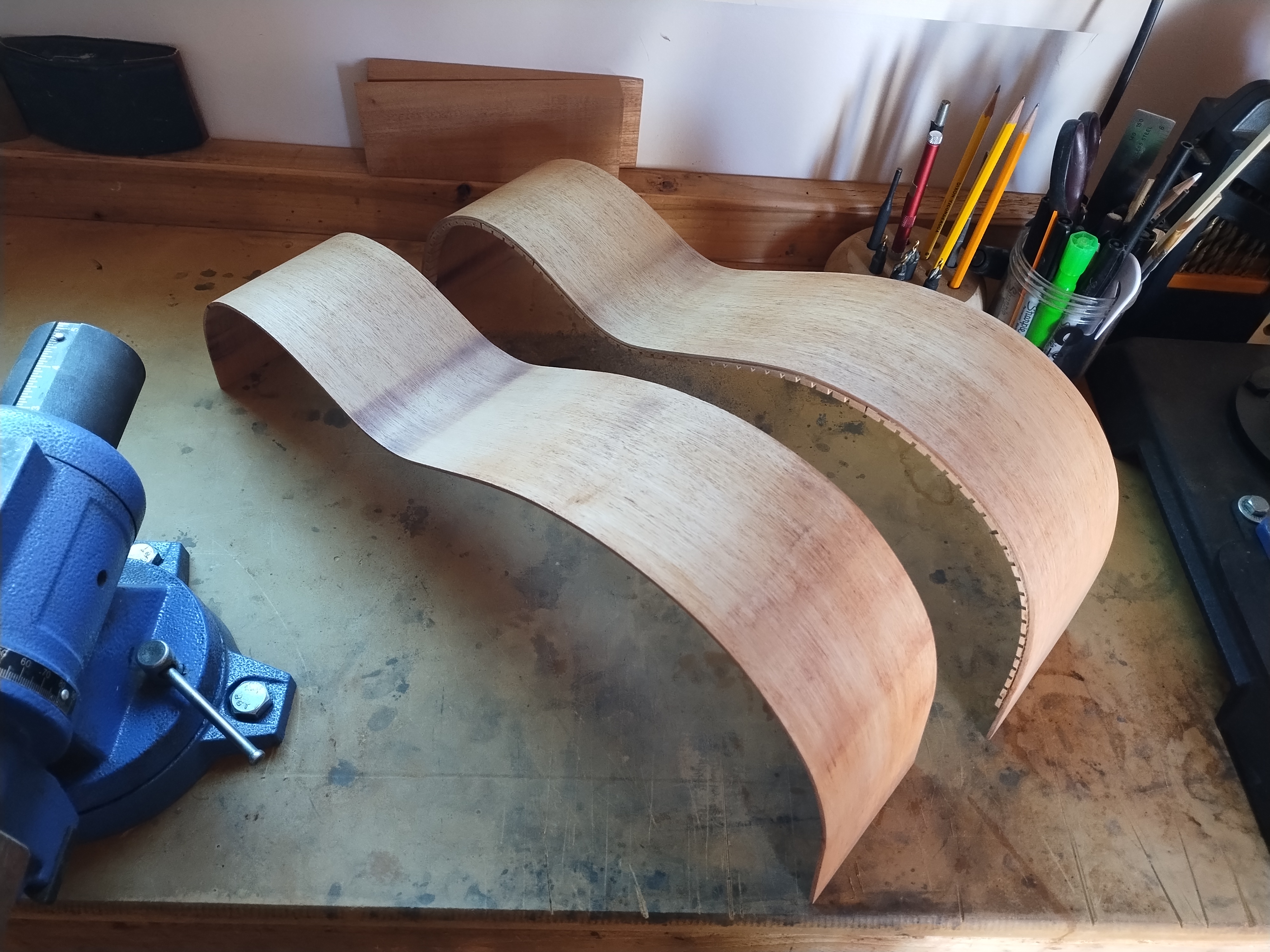 Pair of bent classical guitar sides in the workshop