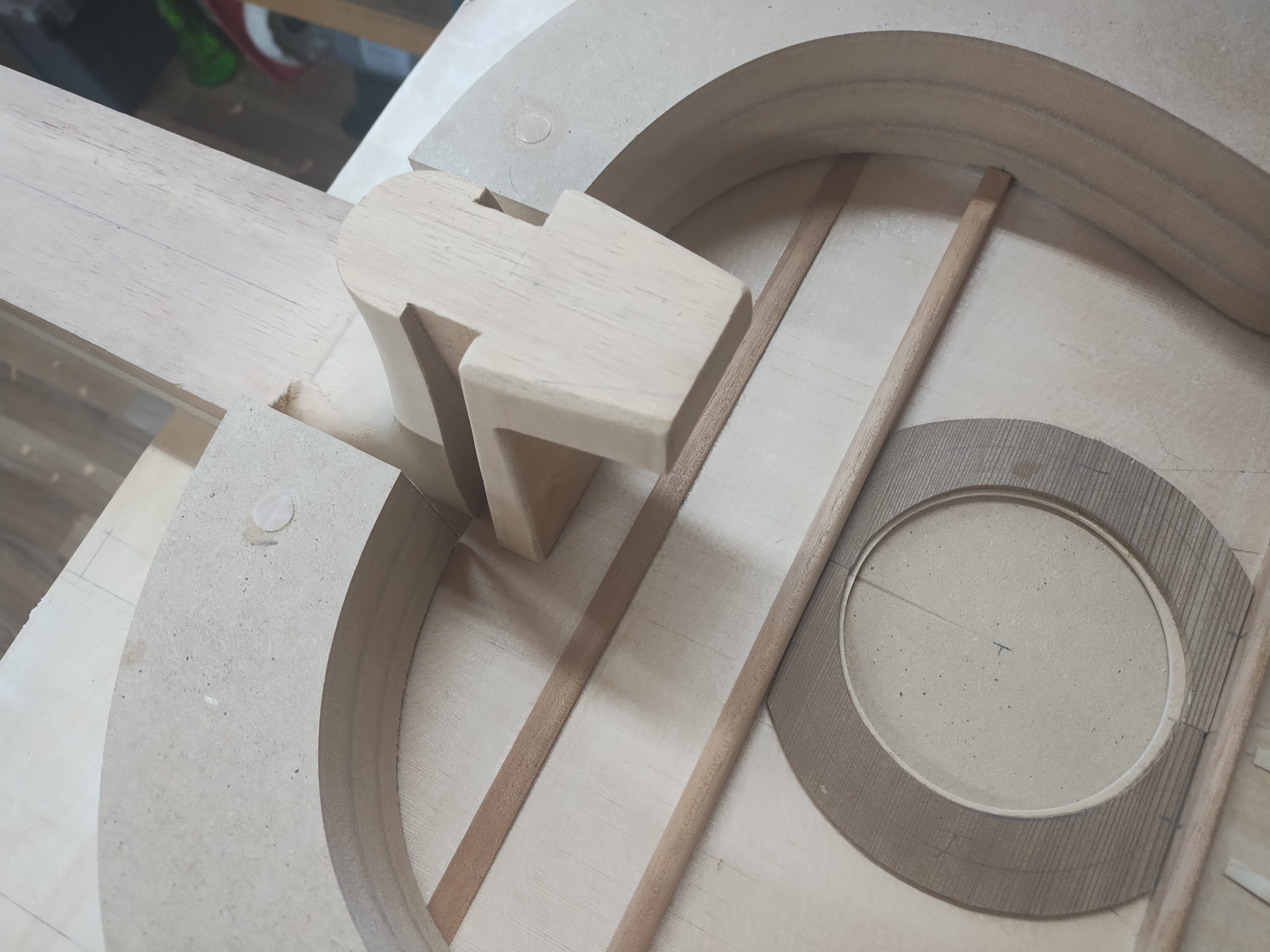Classical guitar top and neck positioned in the solera
