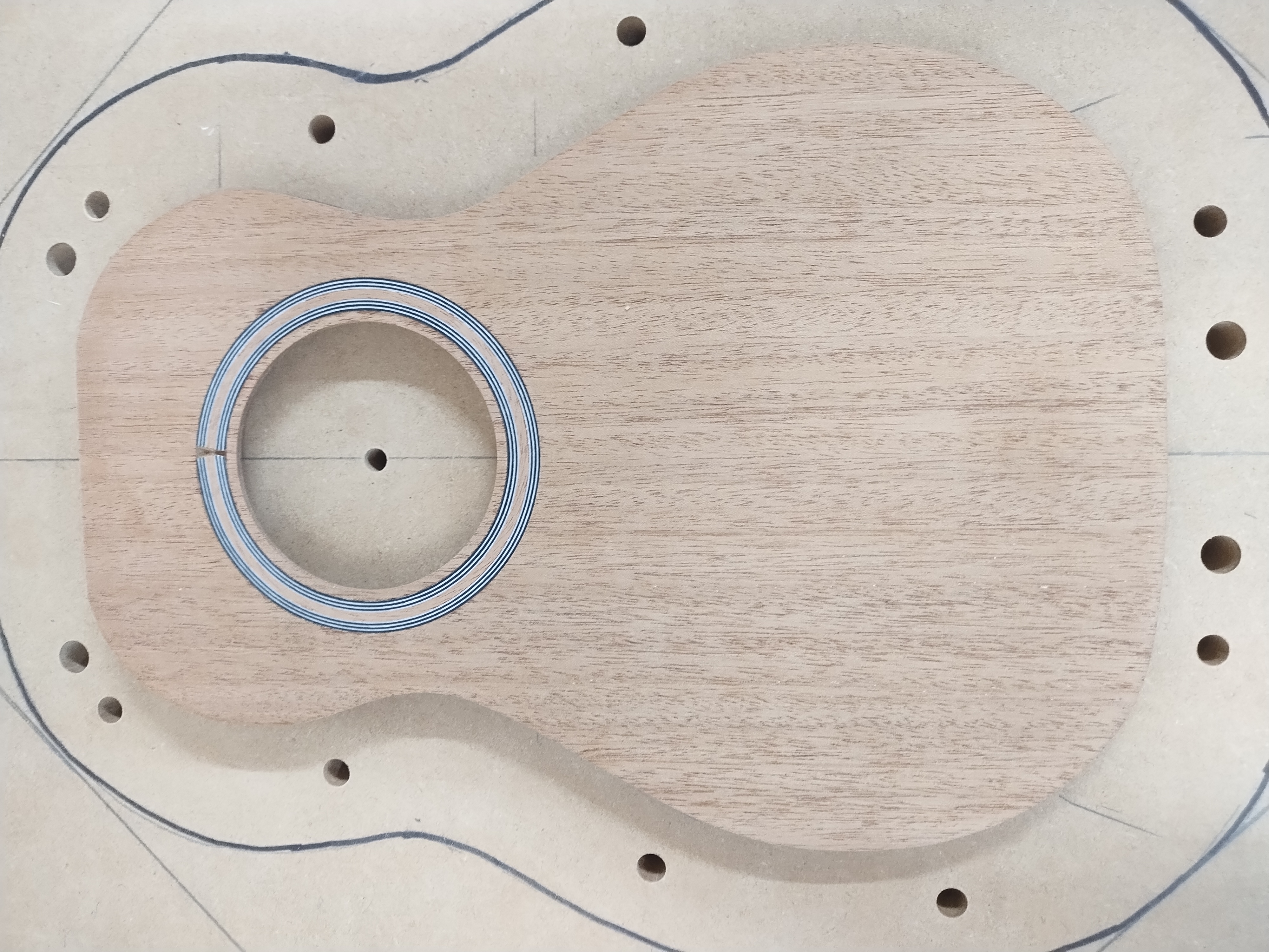 Braced ukulele top with inlaid rosette in the solera