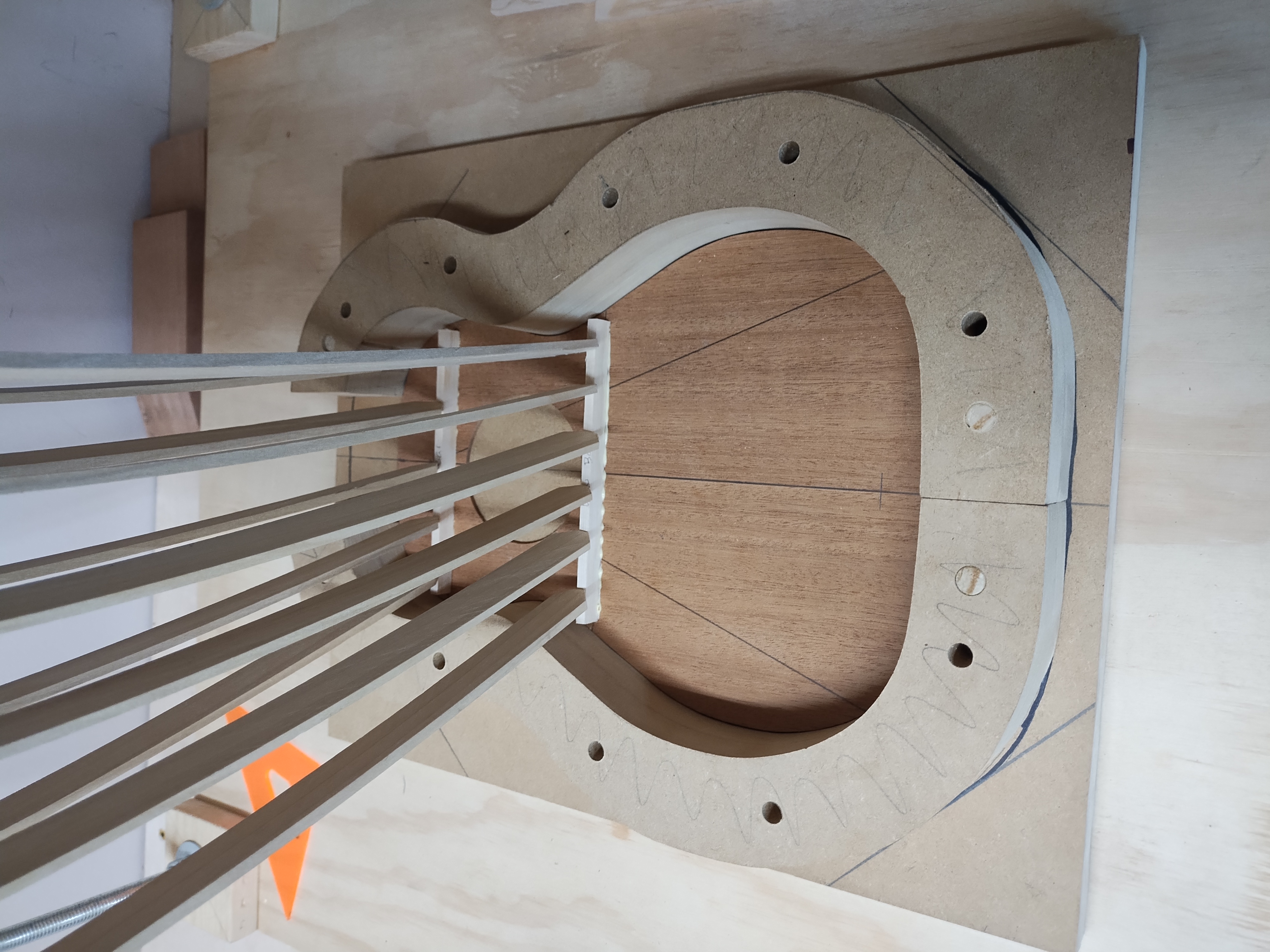 Ukulele top being braced in the solera