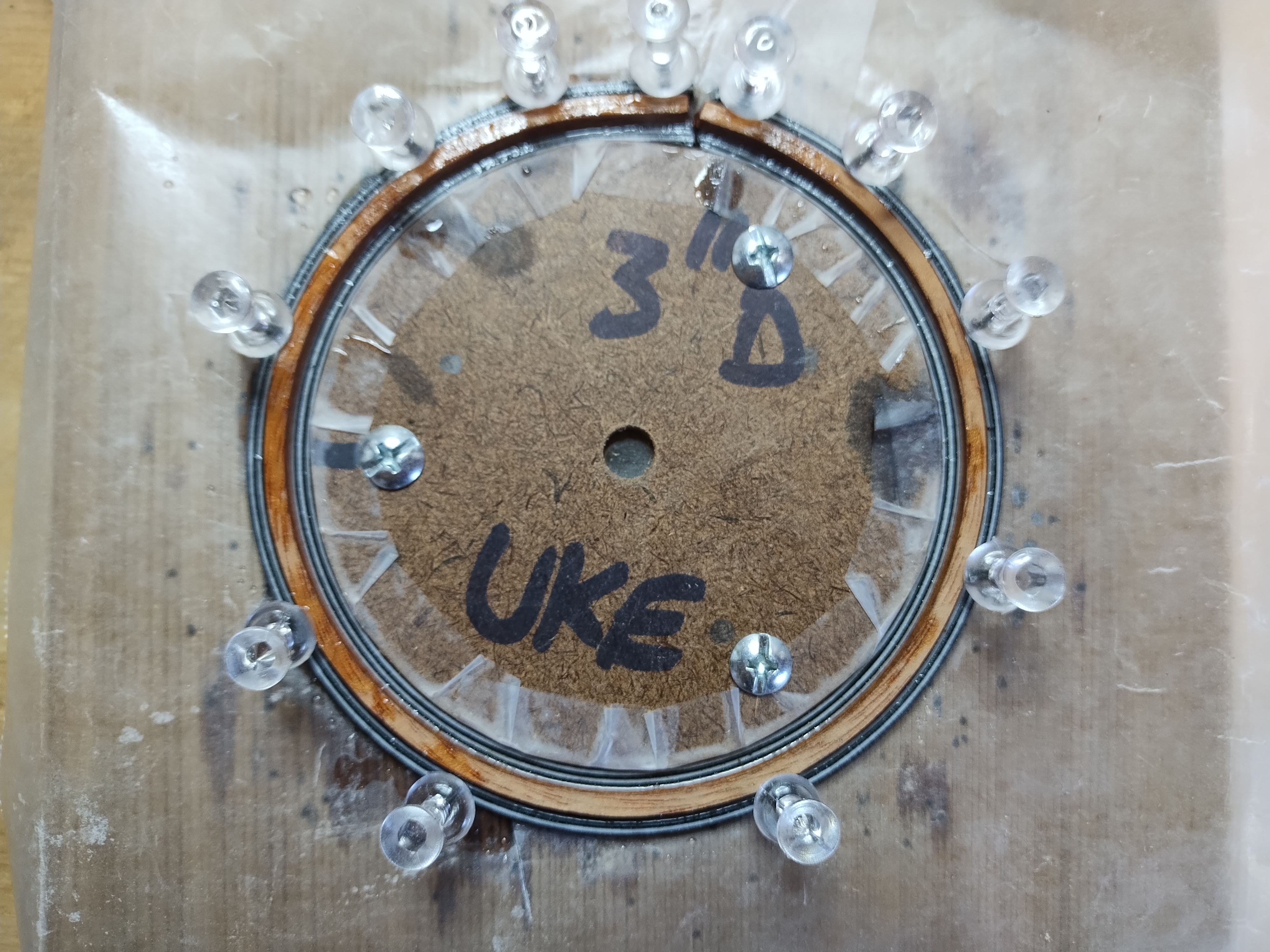 Ukulele rosette being assembled in a circular form
