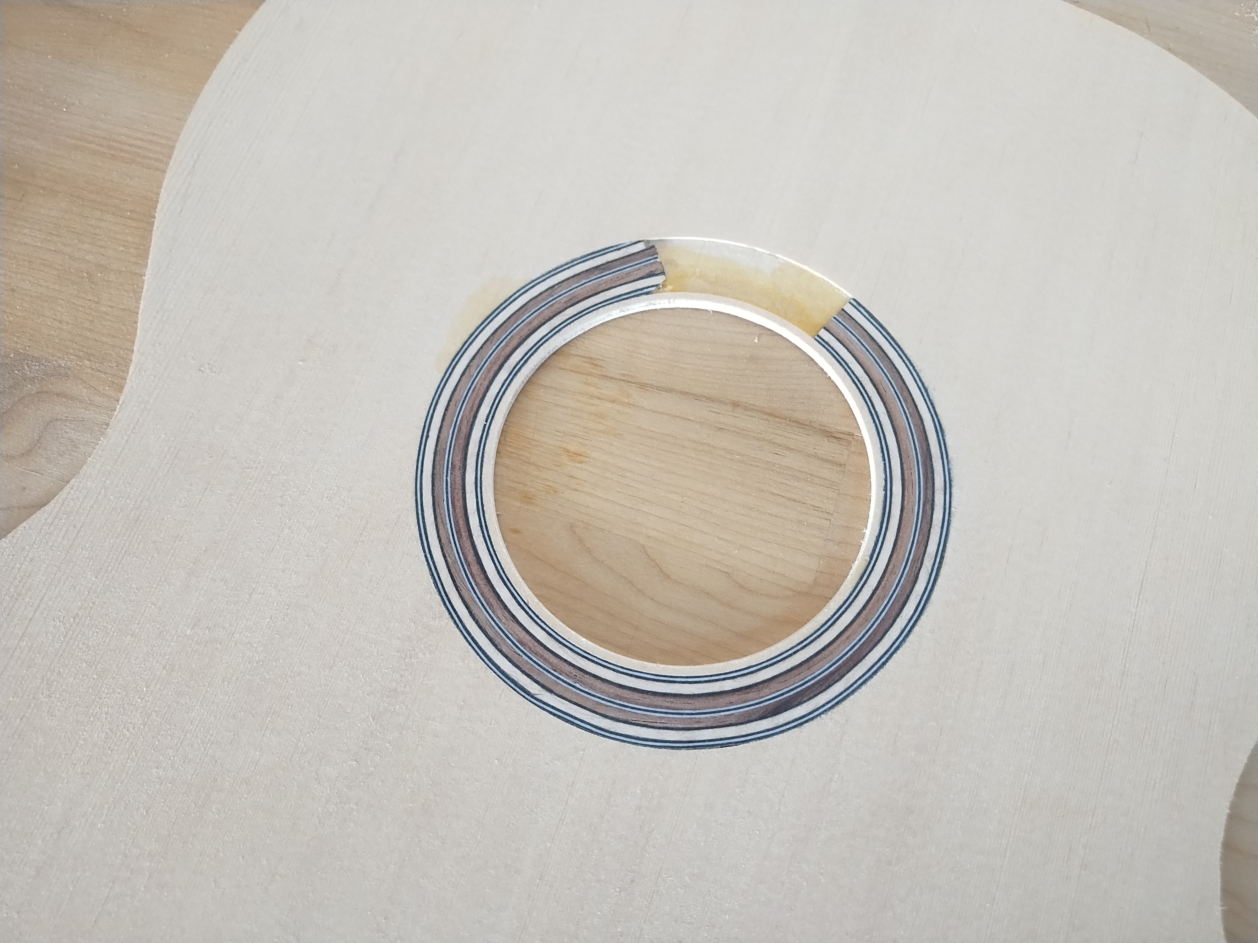 Traditional rosette work on a handcrafted classical guitar